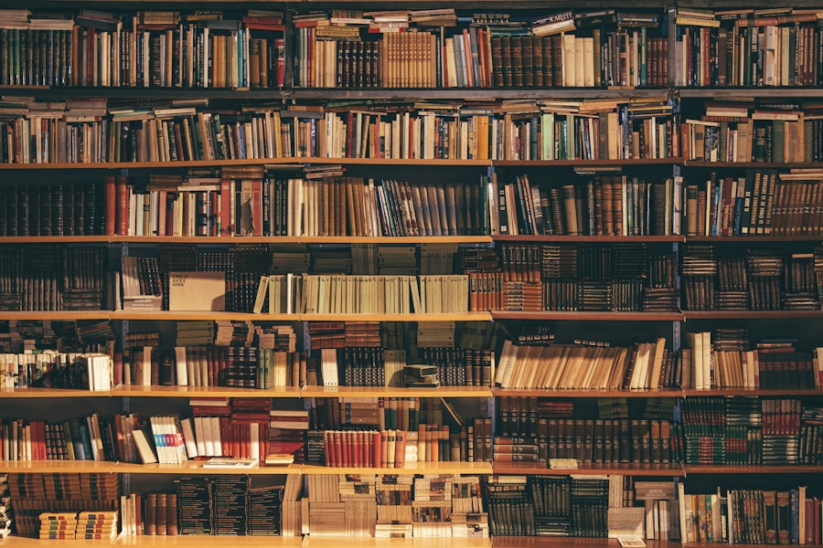 Close view of notebooks and books on studio shelves