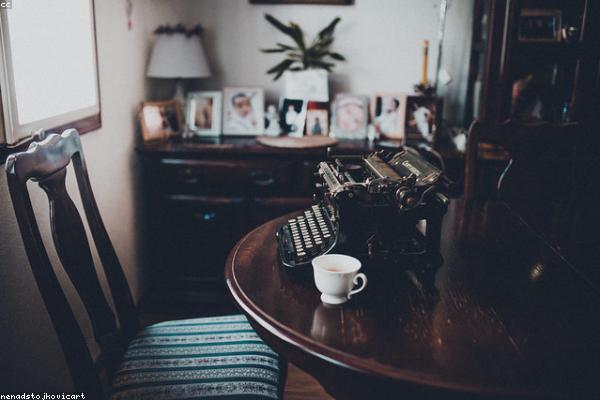 Vintage typewriter with a sheet of paper ready for typing